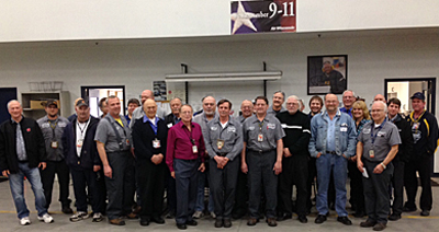 large group in hangar
